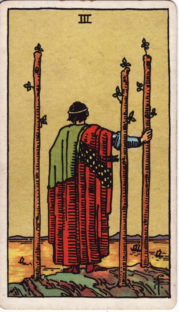 RWS 3 of Wands man looking at the sea waiting for the ships to return